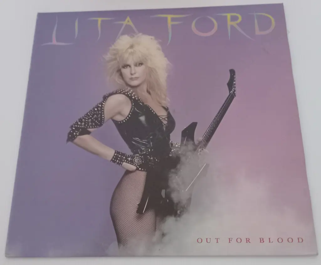 Lita Ford, Out For Blood Image 1++